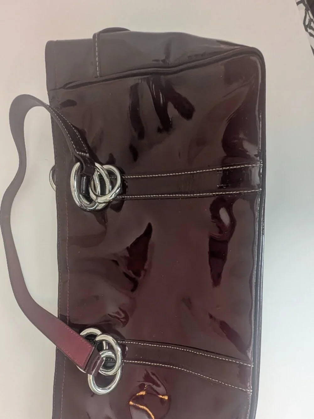 Coach Plum/Burgundy patent leather handbag